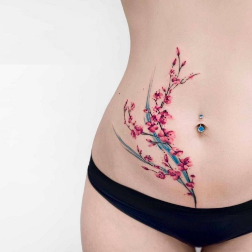 Tatuagem na barriga para meninas. Fotos, esboços de flores, inscrições, animais, padrões