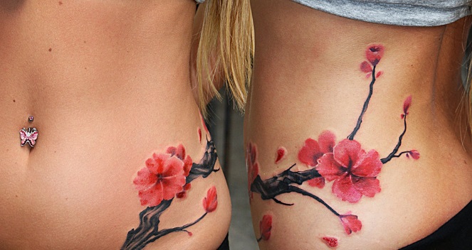 Tatuagem na barriga para meninas. Fotos, esboços de flores, inscrições, animais, padrões