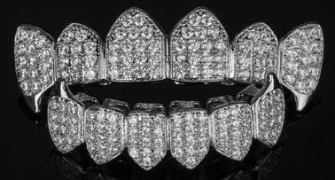 Grelha nos dentes. O que é isso, ouro, prata, diamante, branco. Preço